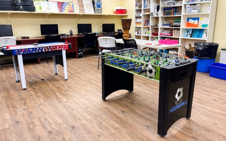 In the basement of the CCLC, there is a youth room featuring computers and games like a foosball and airhockey table. 