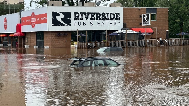 Stranded cars in Bedford, Nova Scotia during the historic flooding in July.