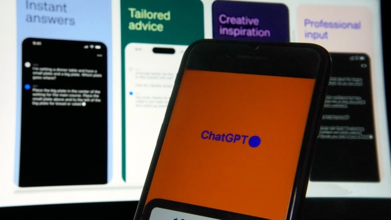 The ChatGPT logo is seen on a cellphone.