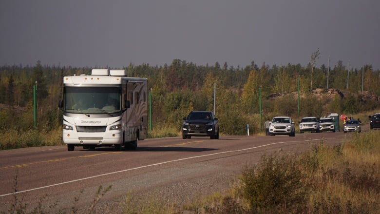 Vehicles traveling on a highway after officials remove a road barrier at 11 a.m. local time on Sept. 6, 2023.