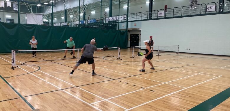 Players playing pickleball at UPEI 