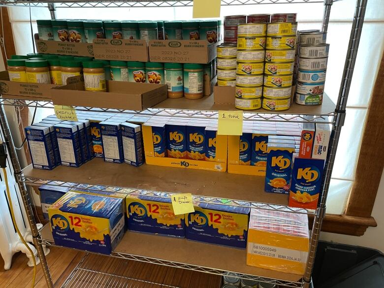 A food pantry with boxed and canned items.