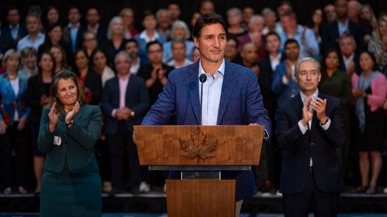 Prime Minister Justin Trudeau, flanked by Finance Minister Chrystia Freeland (left) and Innovation, Science and Industry Minister Francois-Philippe Champagne, announces new cost-of-living measures in London, Ont. on Sept. 14, 2023.