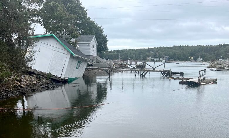 A building is in the water in Purcells Cove after post-tropical storm Lee 