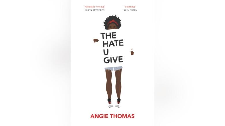 A white book cover featured a young Black girl holding a sign that says The Hate U Give.