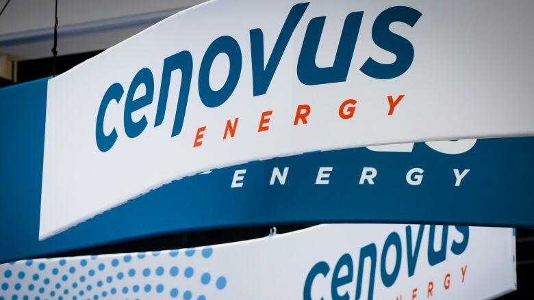 A sign is pictured that reads Cenovus.