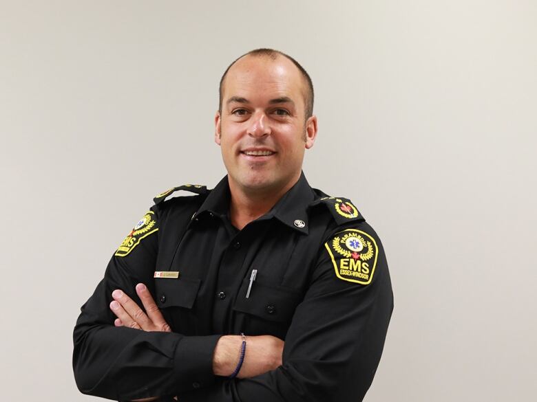 a head shot of a man in a paramedics uniform