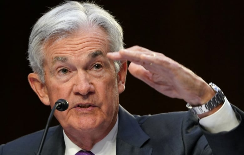 Federal Reserve chair Jerome Powell is shown.