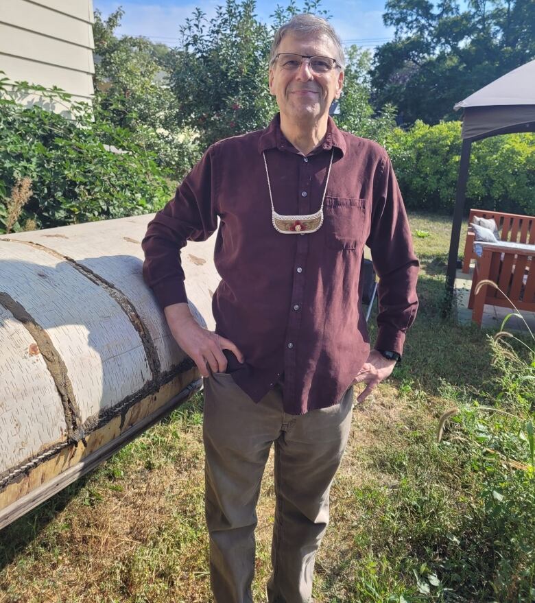 Walt Gordon wearing the medallion made by Ratsnhaienhs (chief) Harry Rice's daughter Tekahawahkwen Rice.