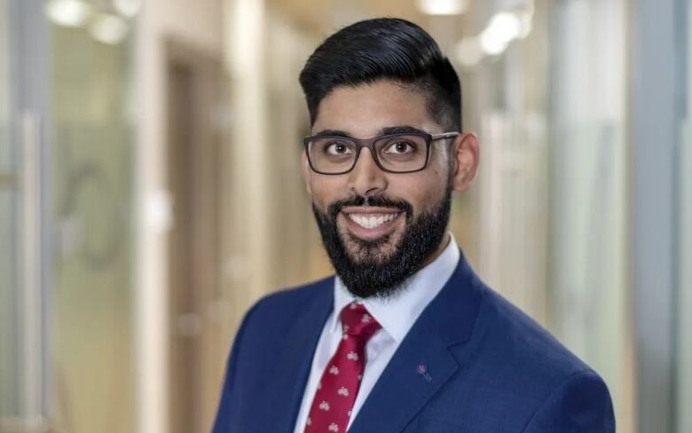 Headshot of guy in a suit