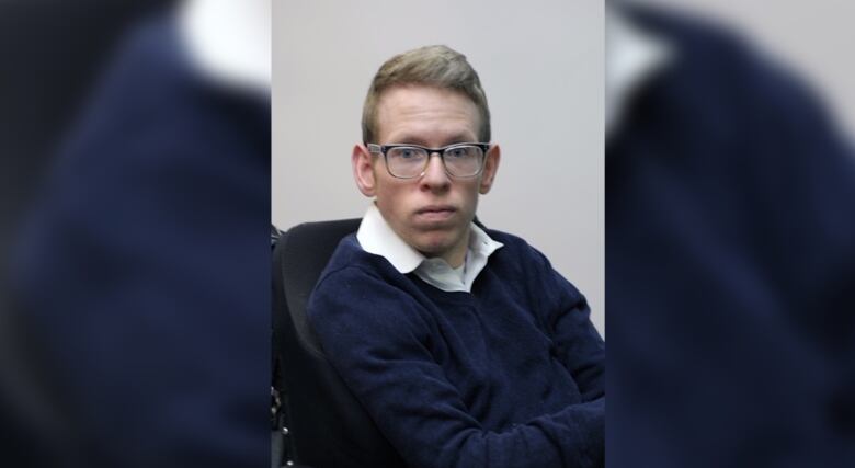 A headshot of disability advocate and consultant Tim Rose. 