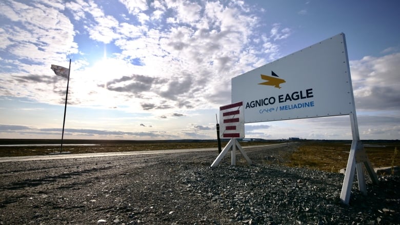 A sign reads Agnico Eagle on the road leading to the Meliadine mine near Rankin Inlet. 