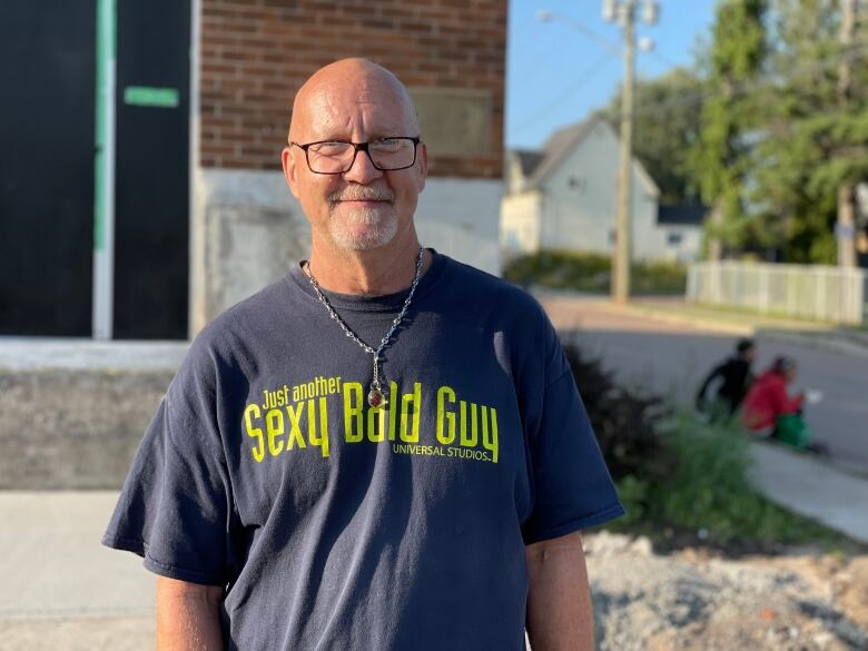 John Renton pictured outside the Humanity Project building