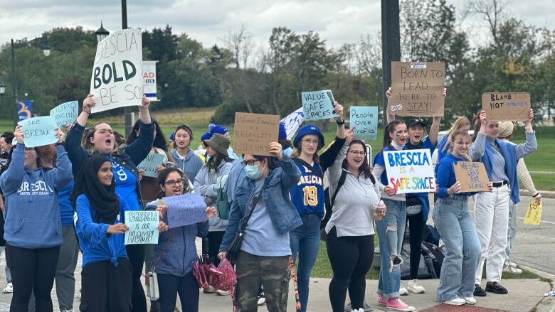 More than 200 students gathered at Brescia on Western Road to protest the women's-only college's decision to integrate into Western University. 