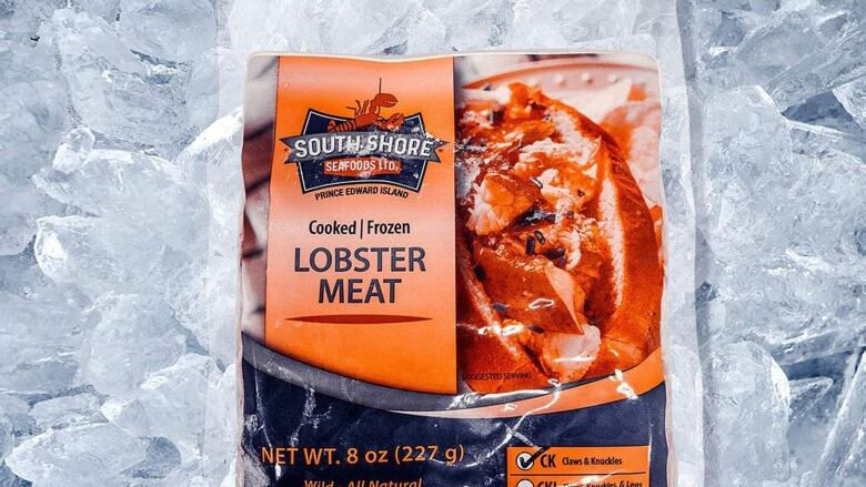 A package of frozen South Shore Lobster meat on ice.