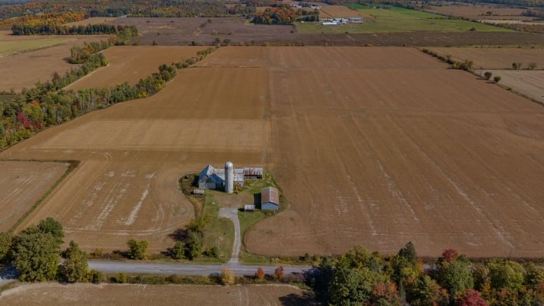 Aerial view of a farm and fields. 