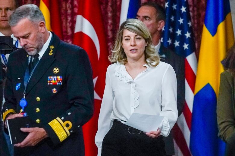 Chairman of NATO's military committee Admiral Rob Bauer, left, and Canadian Foreign Minister Mlanie Joly, center, attend a meeting of NATO's foreign ministers in Oslo, Thursday, June 1, 2023.