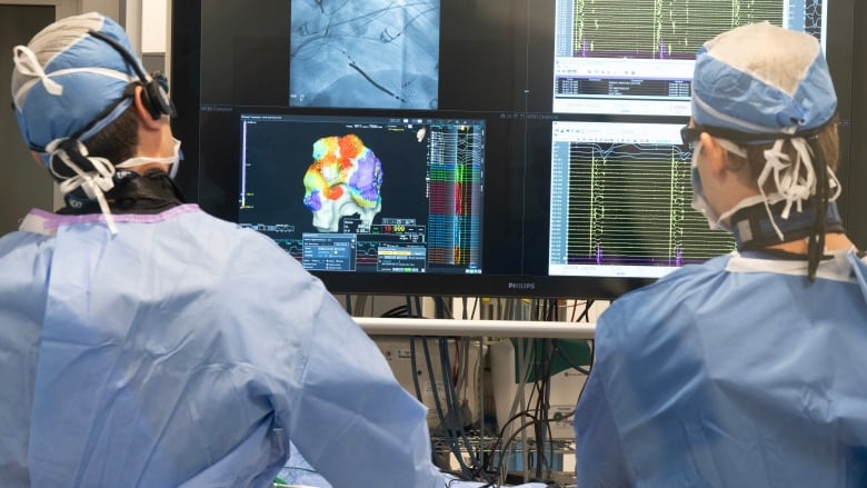 Electrophysiologist Dr. Alexios Hadjis, left, performs a ventricular tachycardia ablation at Sacre-Coeur Hospital, Wednesday, July 26, 2023 in Montreal. 