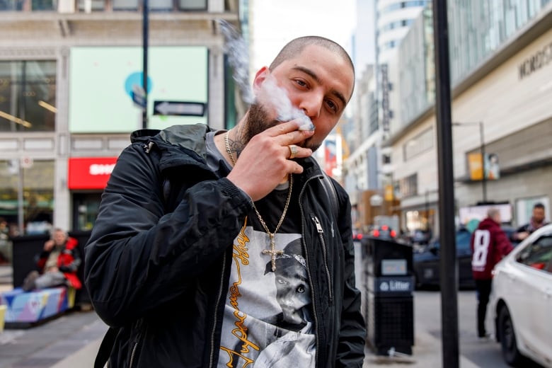 Man smokes a joint on 4/20 in Toronto.