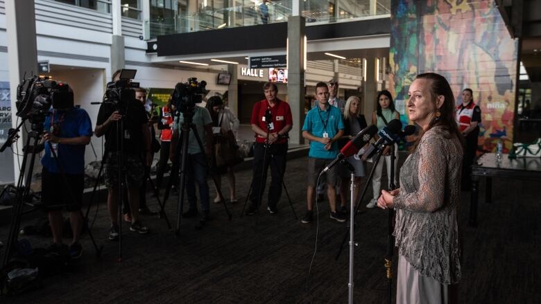 Premier of the Northwest Territories Caroline Cochrane, speaks to media after visiting evacuees in Edmonton, Alta.