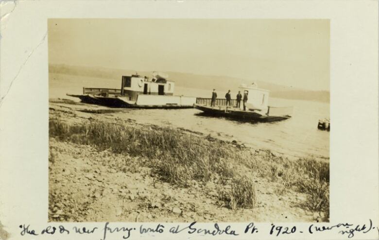 A black-and-white silver print of two river ferries on the Kennebecasis River. 