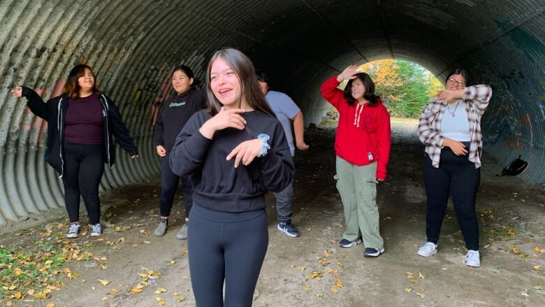 Kids from Sheshatshiu dance for a music video shoot.