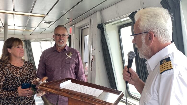 Cheri and Randy Longsdorf renew their vows Saturday in front of Alva Allen, captain of the MC Confederation ferry.