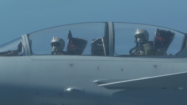 The cockpit of a jet fighter in flight