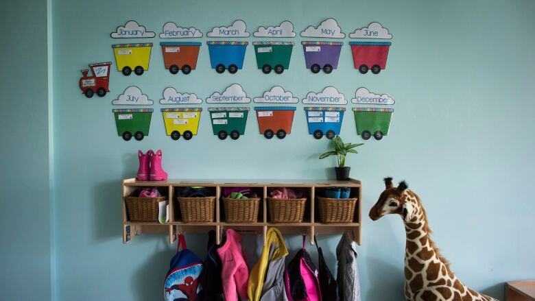 Children's backpacks and shoes are seen at a daycare in Langley, B.C. on May 29, 2018. Several child-care centres across Ontario have had to close their doors for varying lengths of time recently due to staffing shortages. 