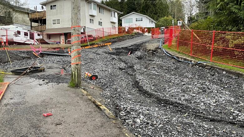 A Prince Rupert street is seen covered in debris left behind by a major water main break.