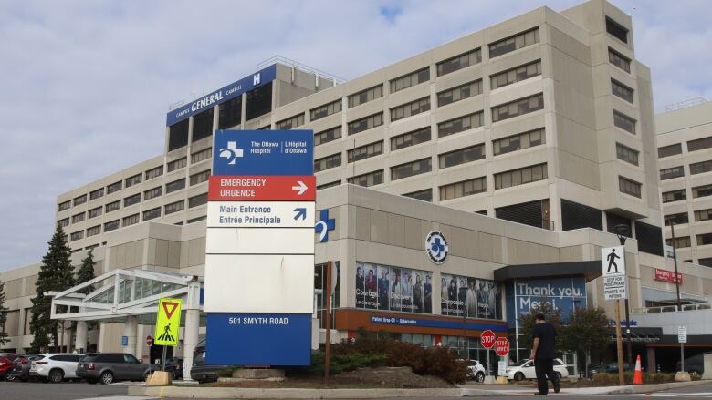 A hospital building on a cloudy day.