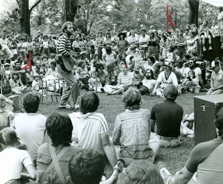 Valdy plays to a crowd at London's Home County Music and Arts Festival in 198