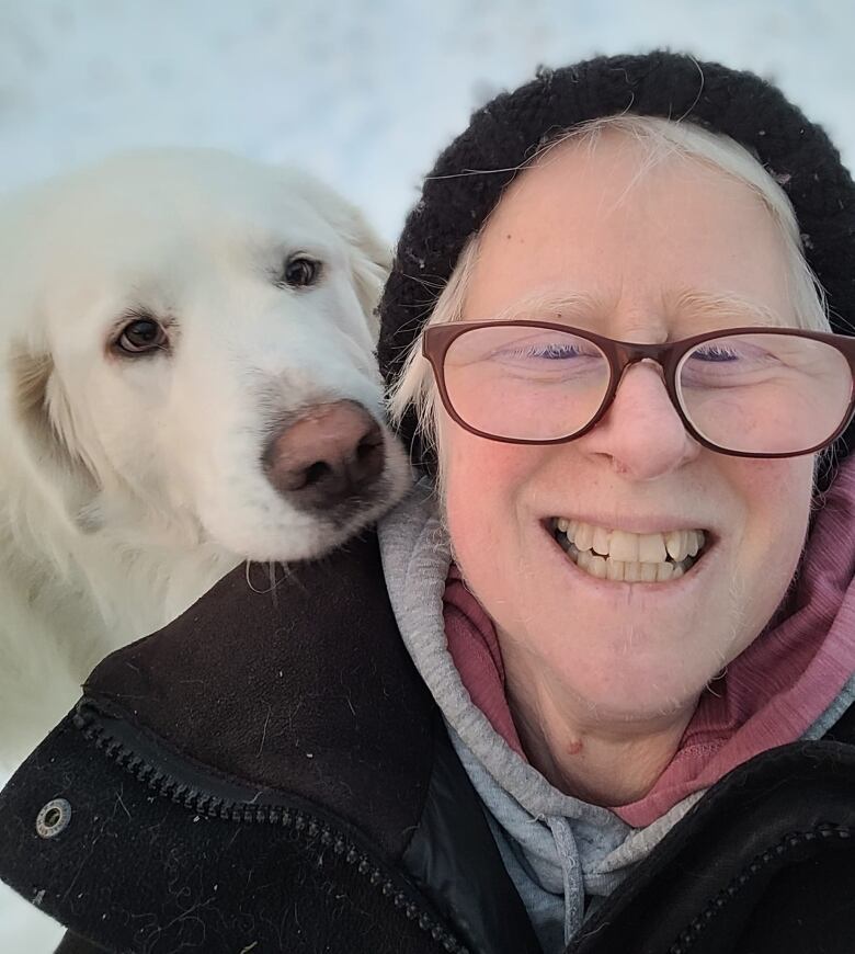 Woman smiling with dog