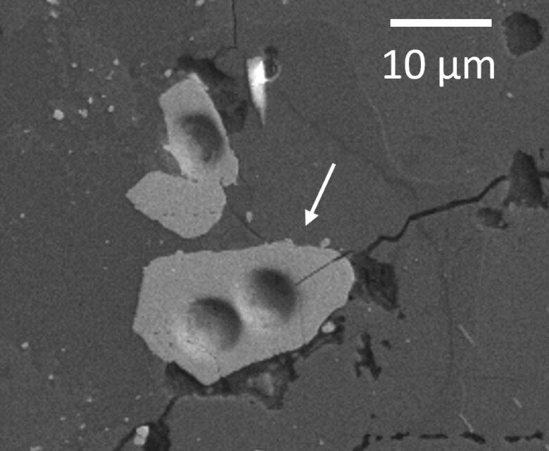 A black-and-white image shows some of the moon rock analyzed in a 2021 study. 