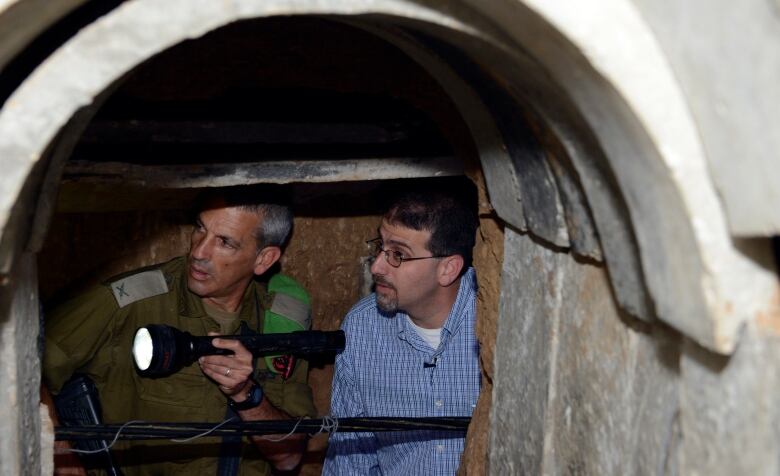 This image, provided by the U.S. Embassy, shows U.S. Ambassador to Israel Dan Shapiro visiting a tunnel which Israeli forces discovered  in 2013.  