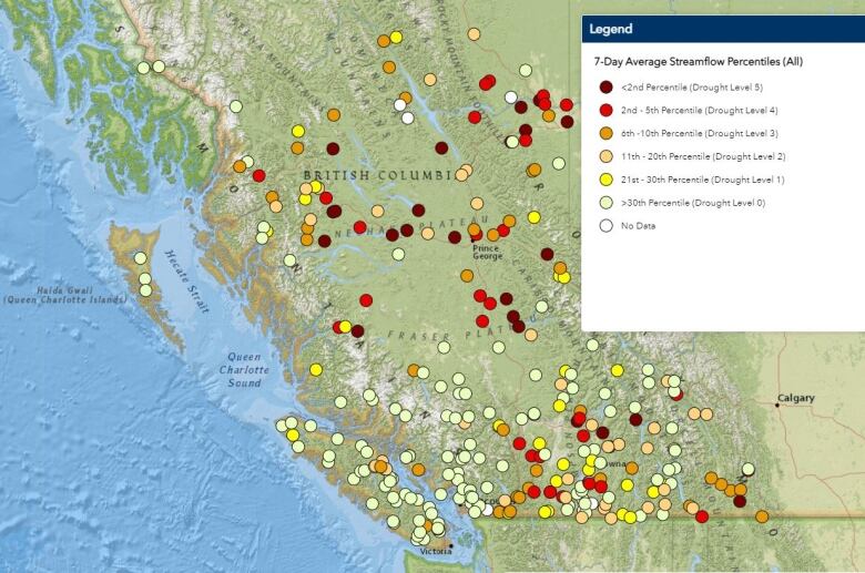 A map of B.C. shows dozens of dots overlaid over provincial rivers, in various shades of colour ranging from dark red to pale yellow and white. A legend box says 