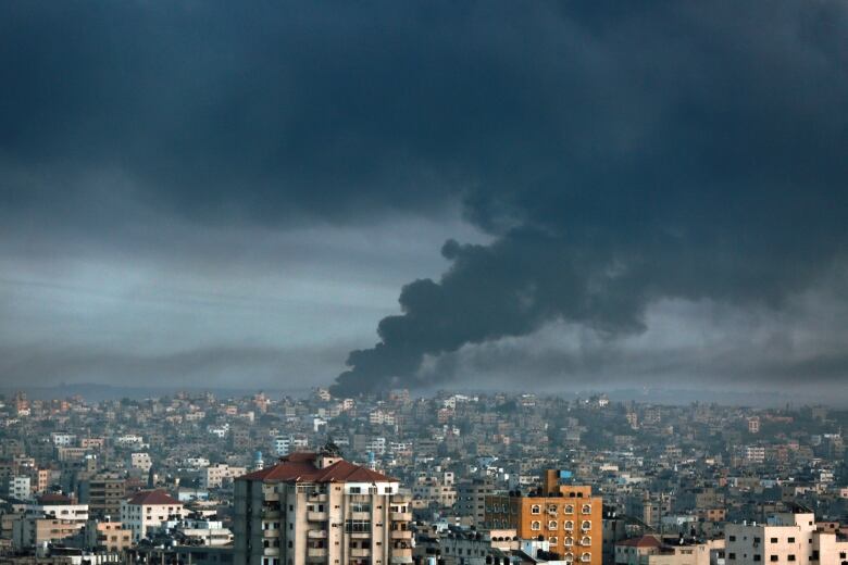 Smoke is seen rising from eastern Gaza City in the wake of Israeli airstrikes.