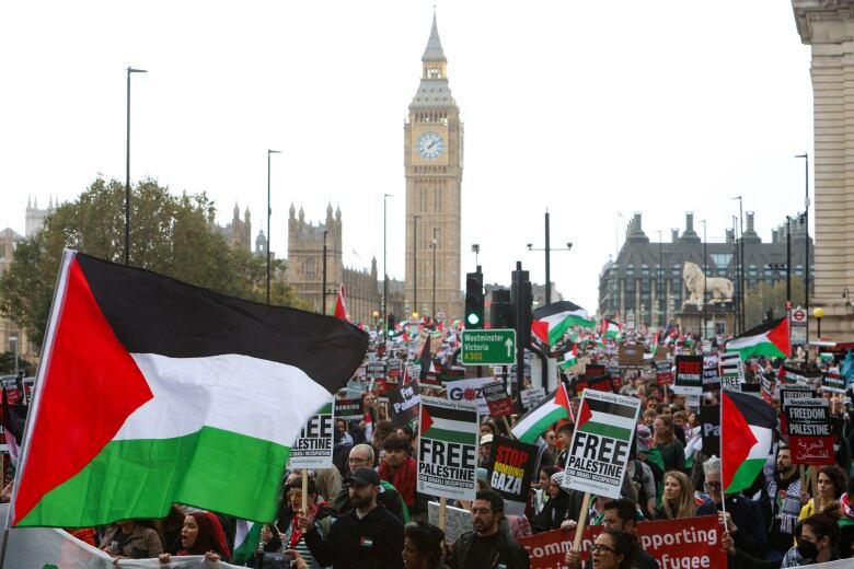 Demonstrators in London protest in solidarity with Palestinians in Gaza.