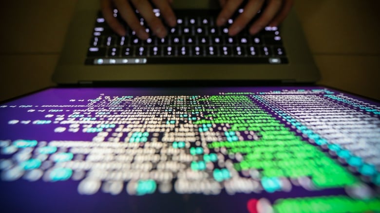 Mandatory Credit: Photo by Ritchie B Tongo/EPA/Shutterstock (8819968a) A programer shows a sample of decrypting source code in Taipei, Taiwan, 13 May, 2017. According to news reports, a 'WannaCry' ransomware cyber attack hits thousands of computers in 99 countries encrypting files from affected computer units and demanding 300 US dollars through bitcoin to decrypt the files. Taiwan Ransomware, Taipei - 13 May 2017