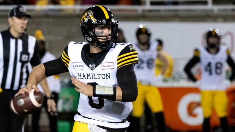 Hamilton Tiger-Cats quarterback Taylor Powell runs the ball during second half CFL football action against the Montreal Alouettes in Montreal on Saturday, Oct. 28, 2023. 