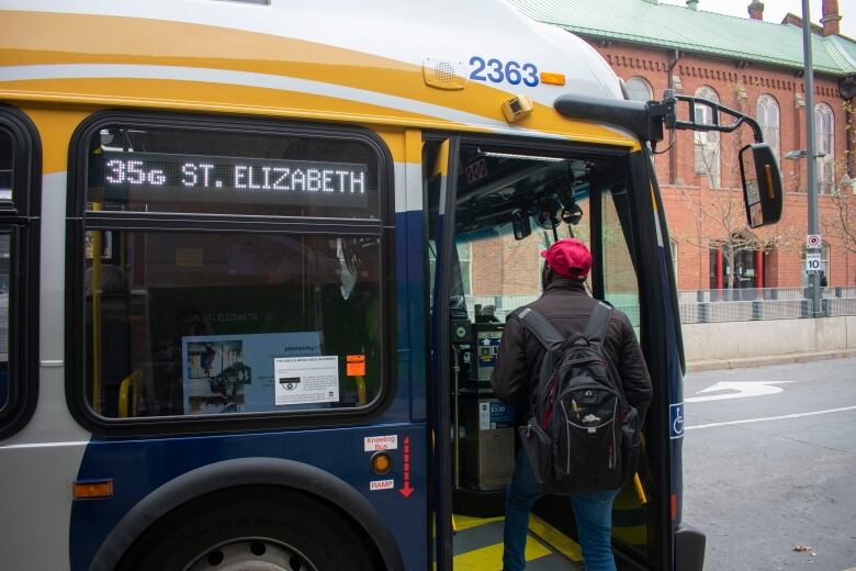 A man boards an HSR bus.