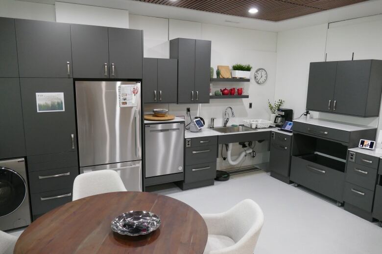 A kitchen with accessibility functions shown in a lab constructed at a medical college.