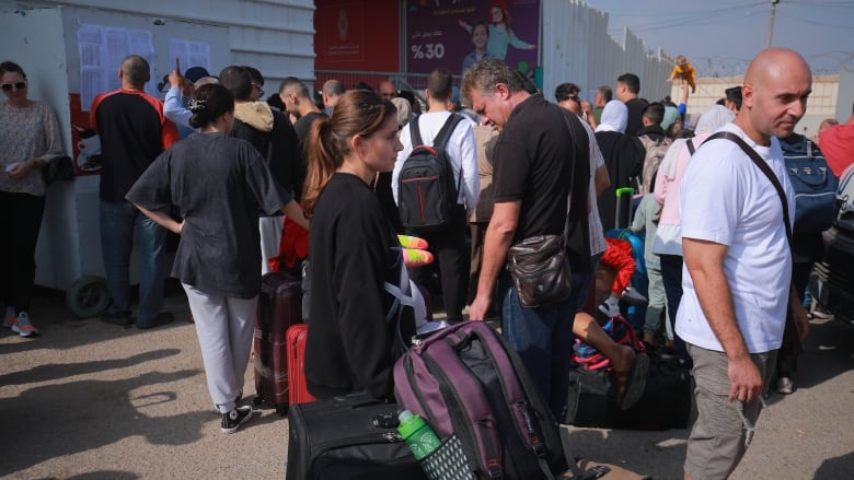 Canadians on the Gaza side of the Rafah border crossing.