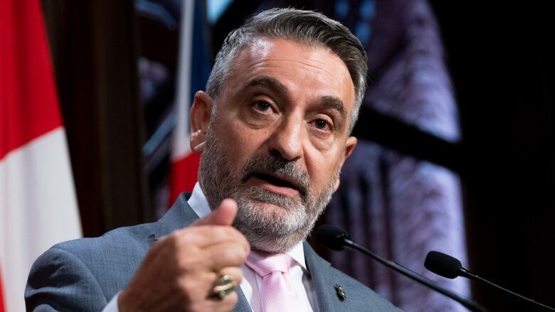 Minister of Municipal Affairs and Housing and Government House Leader Paul Calandra speaks to reporters in Toronto, on Sept. 7, 2023. 