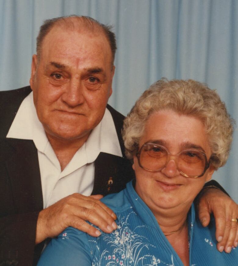 An old picture of an elderly man and woman.