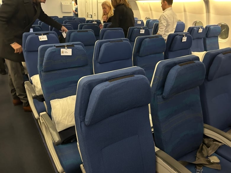 Economy class aircraft seating.