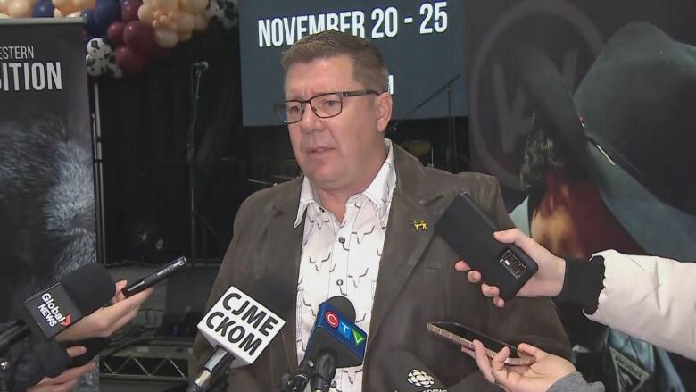 Saskatchewan Premier Scott Moe spoke to reporters about Sask. Party MLA Ryan Domotor's criminal charge at the Canadian Western Agribition in Regina on Monday.