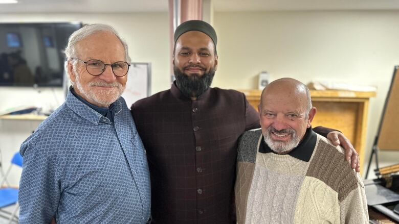 From left to right: Stuart Clark of the Whitehorse United Church, Israr Ahmed, president of the Yukon Muslim Association, and Rick Karp, president of the Jewish Cultural Society of Yukon.