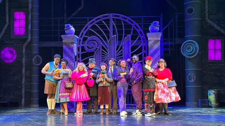 The cast of golden ticket holders outide the gates of Willy Wonka's Chocolate Facorty on the stage of the production of Charlie and the Chocolate Factory at the Grand Theatre in London, Ont.