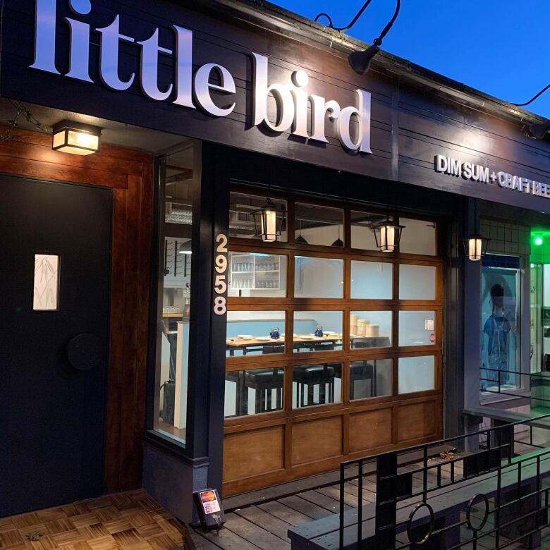 Exterior shot of a small eatery called Little Bird Dim Sum